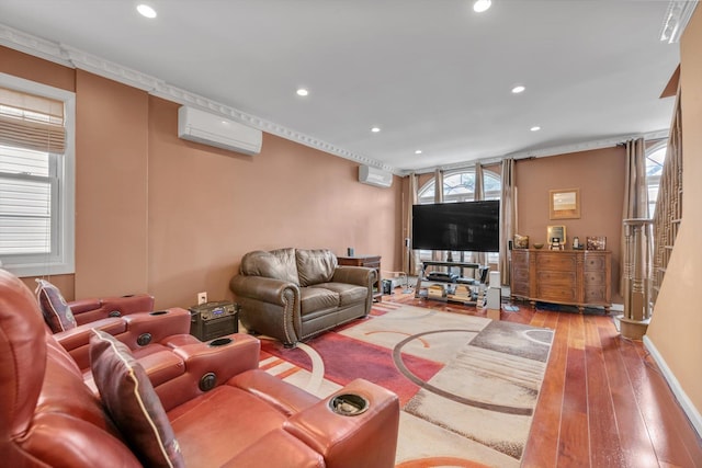 90 Milford St, Brooklyn, NY 11208 - living area featuring an AC wall unit, recessed lighting, hardwood / wood-style flooring, a wall mounted air conditioner, and stairway