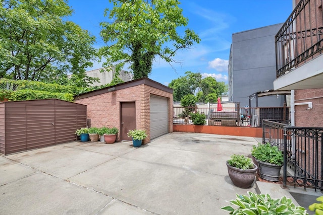 90 Milford St, Brooklyn, NY 11208 - detached garage featuring concrete driveway