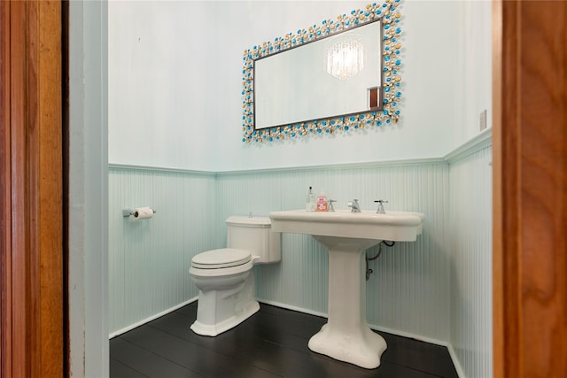 150 Senix Ave, Center Moriches, NY 11934 - half bathroom featuring wainscoting and wood finished floors