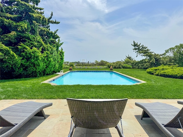 150 Senix Ave, Center Moriches, NY 11934 - outdoor pool with a patio and a yard