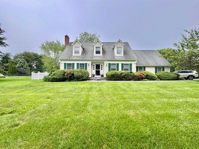 73 Gregory Way, Calverton, NY 11933 - cape cod house with a chimney
