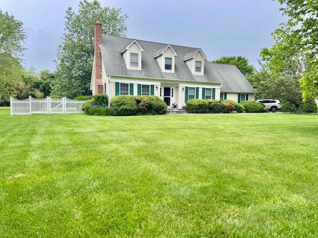 73 Gregory Way, Calverton, NY 11933 - cape cod house with a chimney