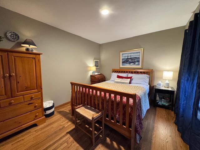73 Gregory Way, Calverton, NY 11933 - bedroom featuring wood finished floors