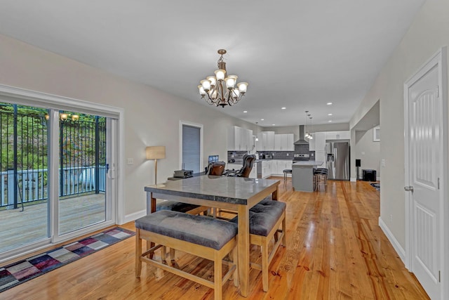 11 Fieldstone Ct, Highland, NY 12528 - dining space featuring a chandelier, light wood-style flooring, baseboards, and recessed lighting