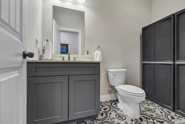 11 Fieldstone Ct, Highland, NY 12528 - bathroom featuring toilet, vanity, and tile patterned floors