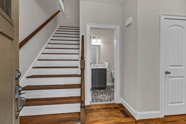 11 Fieldstone Ct, Highland, NY 12528 - stairway with wood finished floors and baseboards