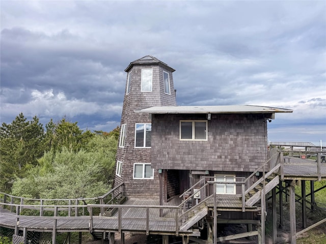 15 Dune Walk, Davis Park, NY 11772 - back of property featuring stairs and a wooden deck