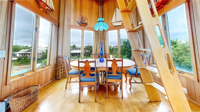 15 Dune Walk, Davis Park, NY 11772 - dining space with wooden walls and wood finished floors