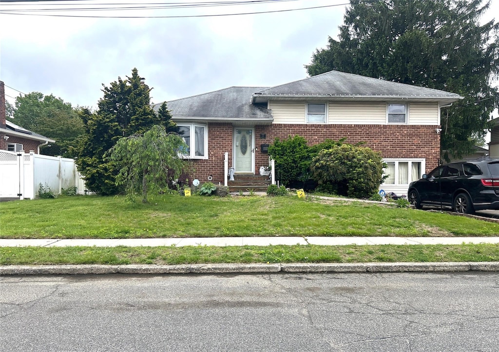 11 Berryhill Ln, Bethpage, NY 11714 - split level home featuring brick siding