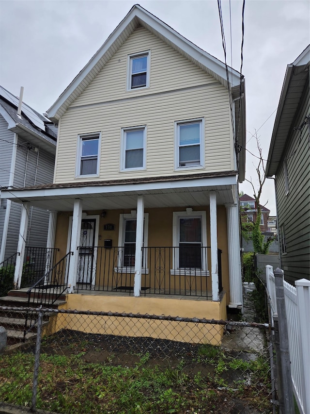 731 E 218th St, Bronx, NY 10467 - view of front of property featuring covered porch