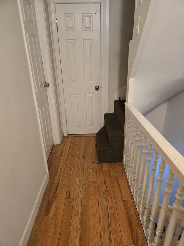 731 E 218th St, Bronx, NY 10467 - hallway with wood finished floors and stairs