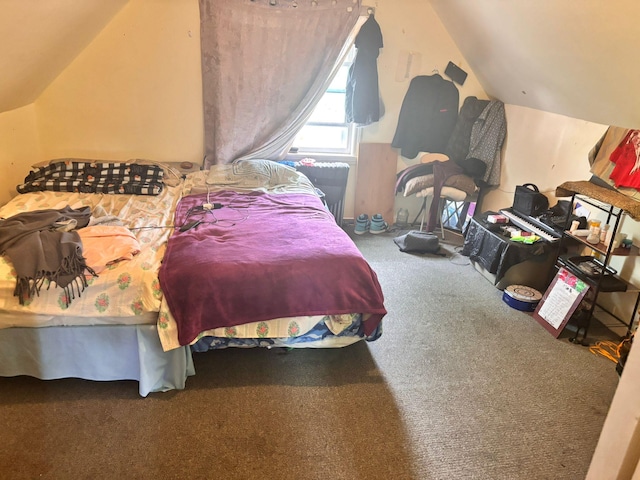 731 E 218th St, Bronx, NY 10467 - bedroom with lofted ceiling and carpet flooring