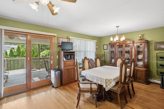 473 S 15th St, Lindenhurst, NY 11757 - dining area with plenty of natural light, light wood-style flooring, and ceiling fan
