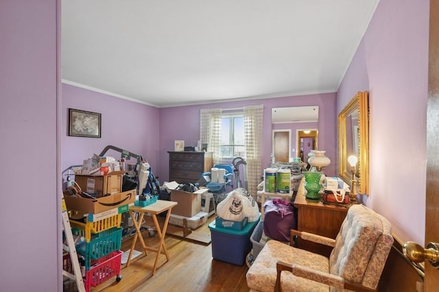 473 S 15th St, Lindenhurst, NY 11757 - living area with wood finished floors and crown molding