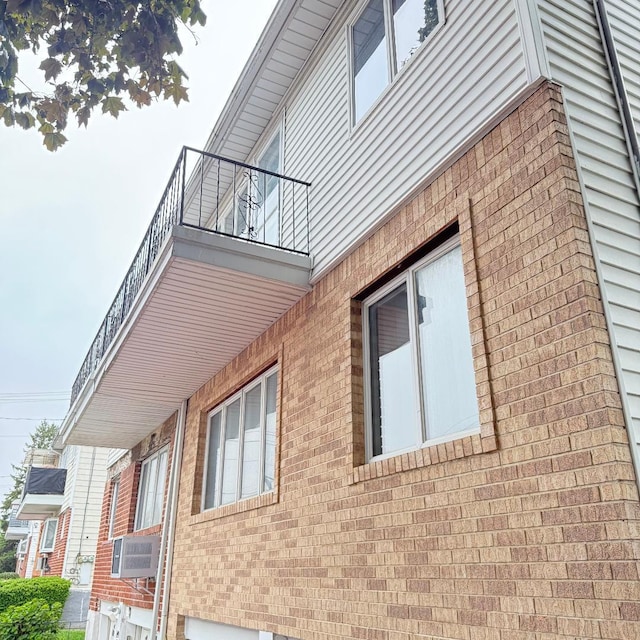 149-45 83rd St, Howard Beach, NY 11414 - view of side of property featuring brick siding
