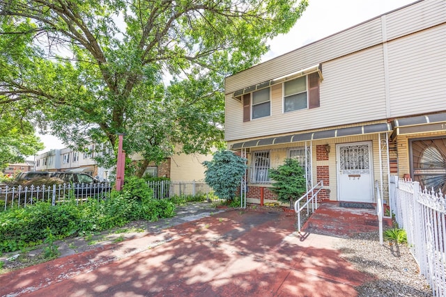 124 Herzl St, Brooklyn, NY 11212 - view of front of house with brick siding