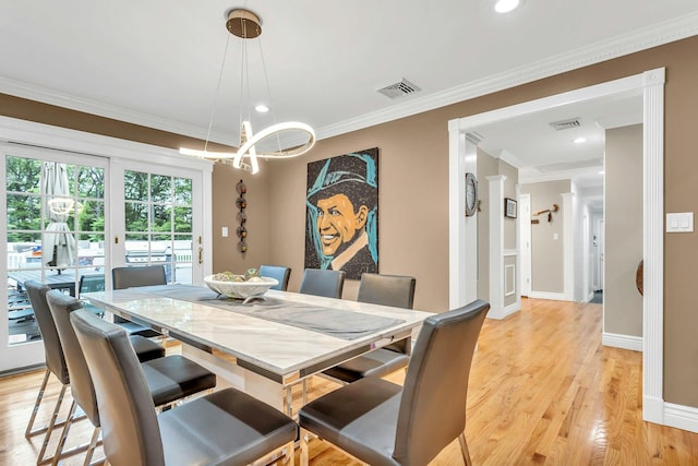 21 Buttonwood Dr, Dix Hills, NY 11746 - dining room with light wood-type flooring, a chandelier, ornamental molding, baseboards, and recessed lighting