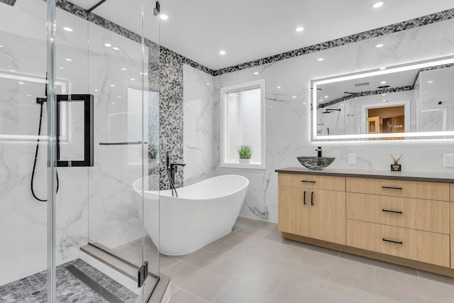 21 Buttonwood Dr, Dix Hills, NY 11746 - full bathroom featuring vanity, a marble finish shower, and a soaking tub