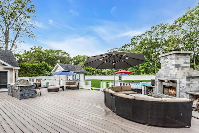 21 Buttonwood Dr, Dix Hills, NY 11746 - wooden terrace featuring an outdoor living space with a fireplace and a fenced backyard