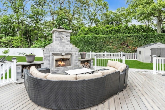 21 Buttonwood Dr, Dix Hills, NY 11746 - deck featuring an outdoor living space with a fireplace and view of scattered trees