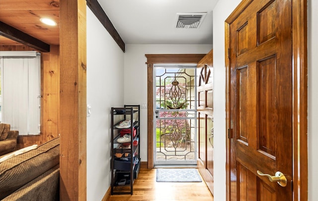 11 Gilford Ct, Melville, NY 11747 - foyer entrance featuring light wood-type flooring and baseboards
