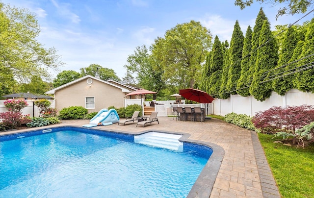 11 Gilford Ct, Melville, NY 11747 - view of swimming pool featuring a fenced backyard and a patio area