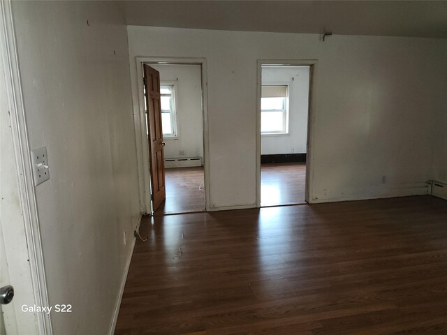 32 Yonkers Ave, Yonkers, NY 10701 - spare room with a baseboard radiator, plenty of natural light, and wood finished floors