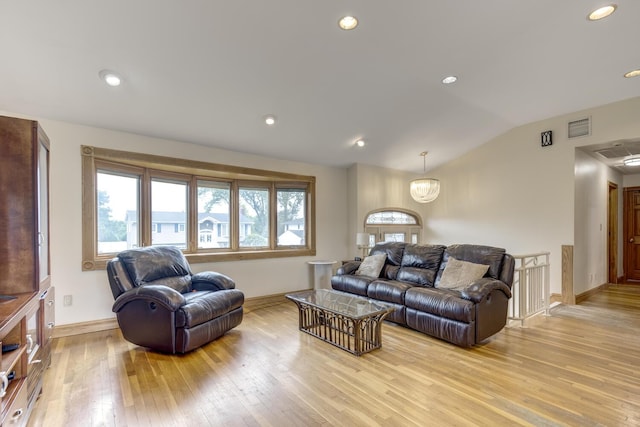 27 Suzanne Ln, Bethpage, NY 11714 - living area with vaulted ceiling, baseboards, light wood-style floors, and recessed lighting