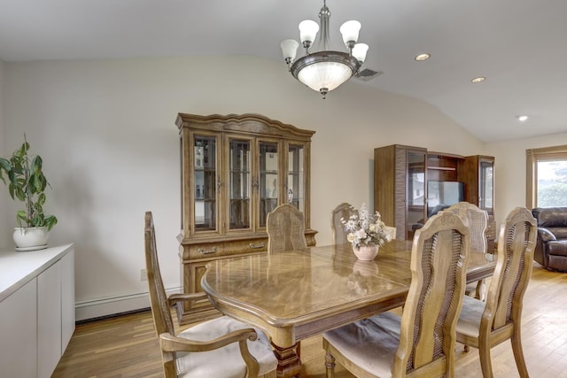 27 Suzanne Ln, Bethpage, NY 11714 - dining space featuring lofted ceiling, wood finished floors, baseboard heating, a chandelier, and recessed lighting
