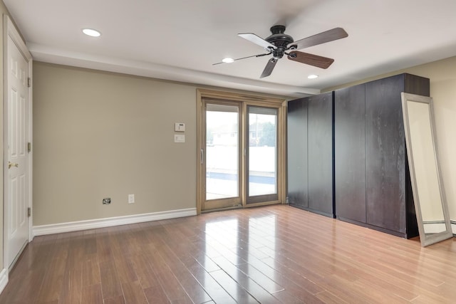 27 Suzanne Ln, Bethpage, NY 11714 - empty room featuring recessed lighting, wood finished floors, a ceiling fan, baseboards, and a baseboard radiator