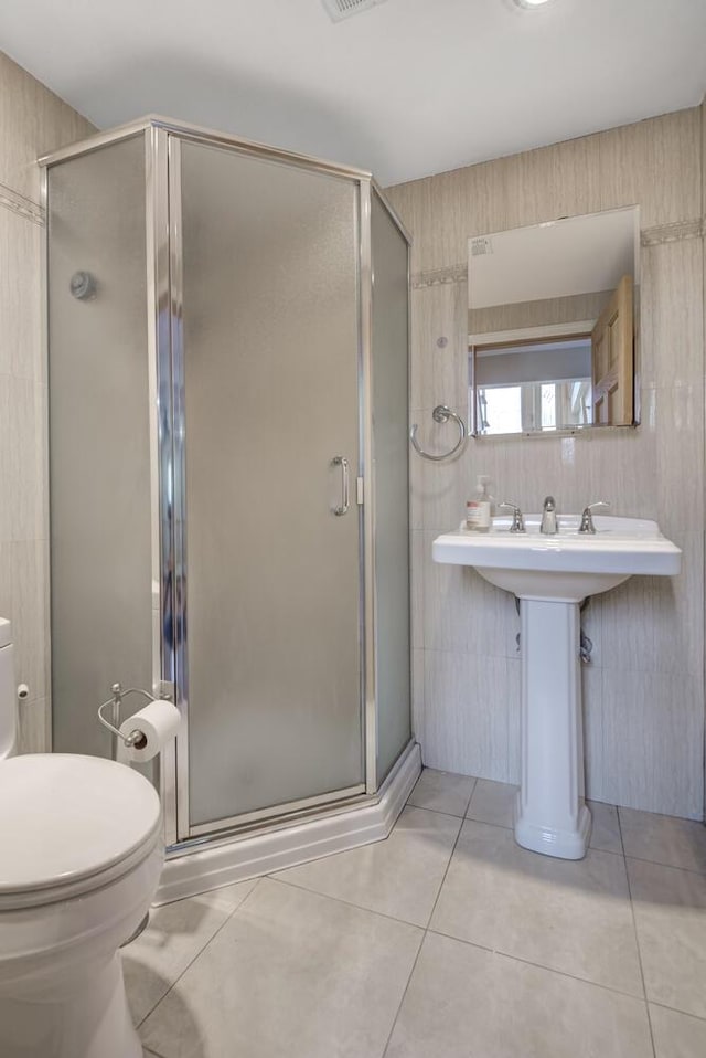 27 Suzanne Ln, Bethpage, NY 11714 - full bathroom with toilet, a shower stall, and tile patterned floors
