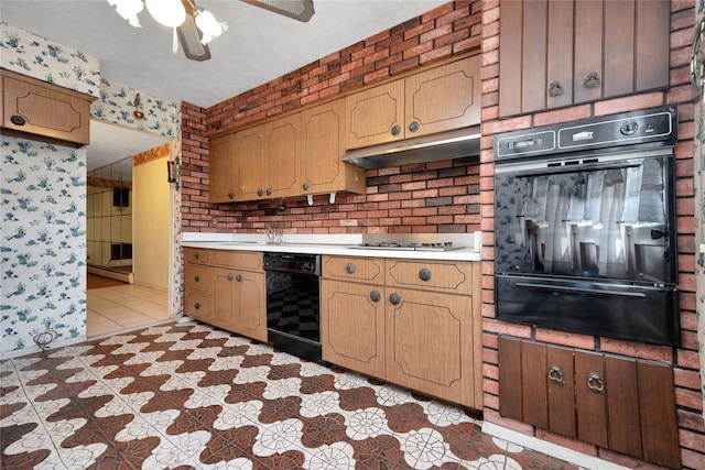 69-14 61st Rd, Middle Village, NY 11379 - kitchen with a warming drawer, black appliances, light countertops, wallpapered walls, and ceiling fan