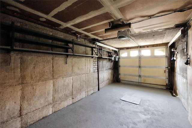 69-14 61st Rd, Middle Village, NY 11379 - garage featuring a garage door opener