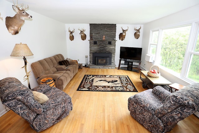 342 Bernas Rd, Cochecton, NY 12726 - living area with wood finished floors and a fireplace