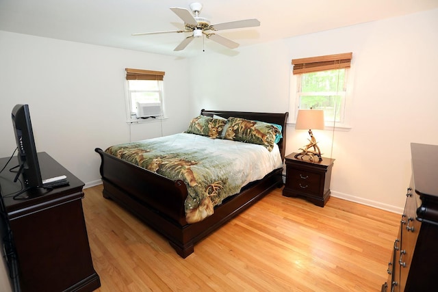 342 Bernas Rd, Cochecton, NY 12726 - bedroom with multiple windows, light wood-style flooring, and baseboards