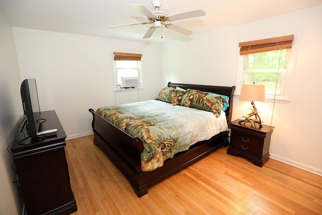 342 Bernas Rd, Cochecton, NY 12726 - bedroom with light wood-style floors, multiple windows, and baseboards