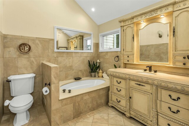 16 Abbey Ln, East Setauket, NY 11733 - full bath featuring a garden tub, vaulted ceiling, toilet, vanity, and tile patterned flooring