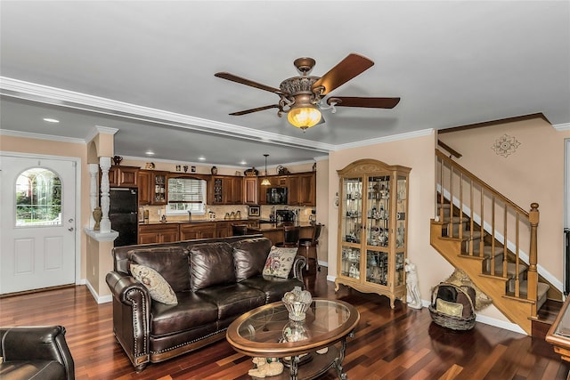 16 Abbey Ln, East Setauket, NY 11733 - living room with ceiling fan, dark wood-type flooring, crown molding, stairway, and baseboards