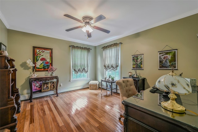 16 Abbey Ln, East Setauket, NY 11733 - home office featuring a ceiling fan, light wood-style flooring, ornamental molding, and baseboards