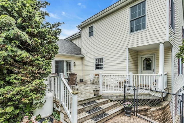 16 Abbey Ln, East Setauket, NY 11733 - rear view of house with a deck