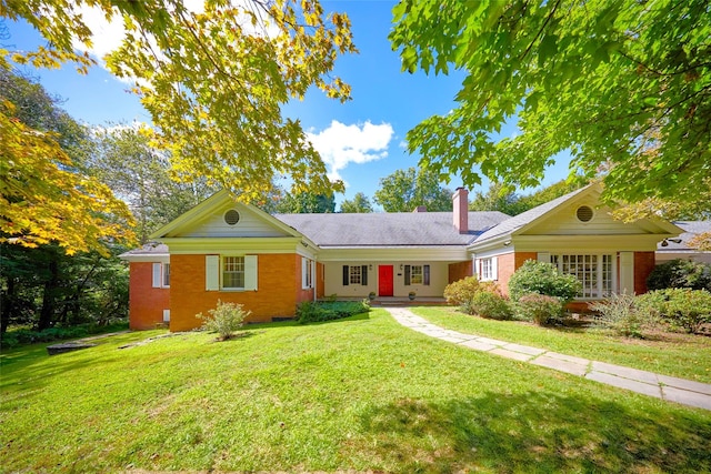 94 Cedar Ave, Poughkeepsie, NY 12603 - ranch-style house with a chimney, a front yard, and brick siding