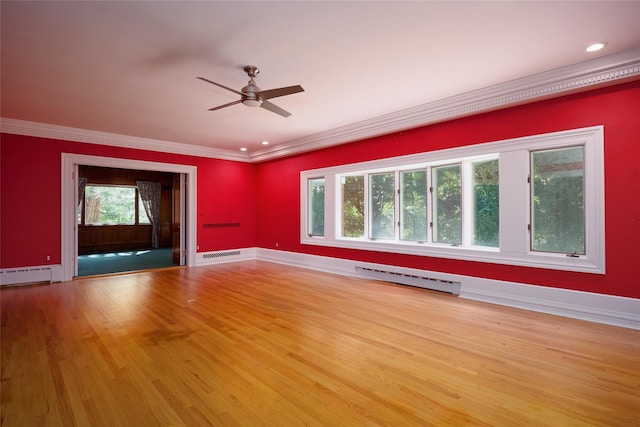 94 Cedar Ave, Poughkeepsie, NY 12603 - unfurnished room with a baseboard heating unit, ornamental molding, ceiling fan, wood finished floors, and baseboards