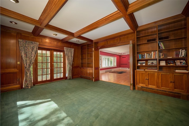 94 Cedar Ave, Poughkeepsie, NY 12603 - unfurnished living room featuring beam ceiling, coffered ceiling, carpet flooring, french doors, and wooden walls