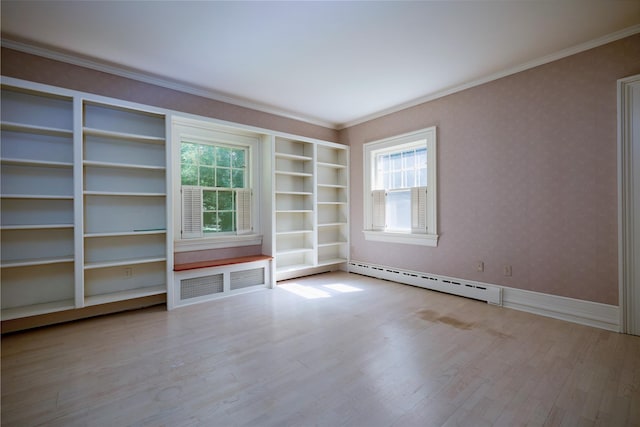 94 Cedar Ave, Poughkeepsie, NY 12603 - unfurnished room with a baseboard heating unit, wood finished floors, ornamental molding, and built in shelves