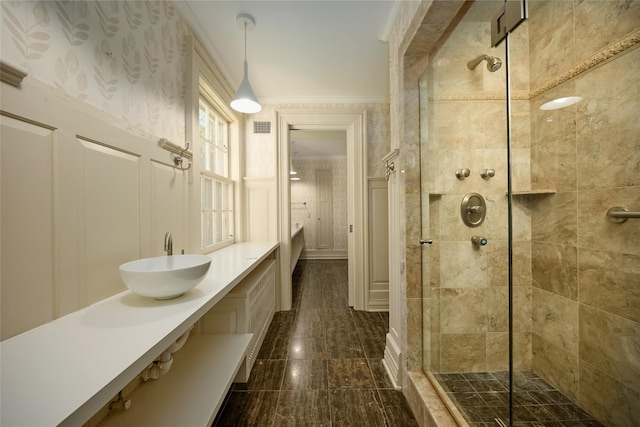 94 Cedar Ave, Poughkeepsie, NY 12603 - full bathroom featuring a decorative wall, a shower stall, vanity, wainscoting, and ornamental molding