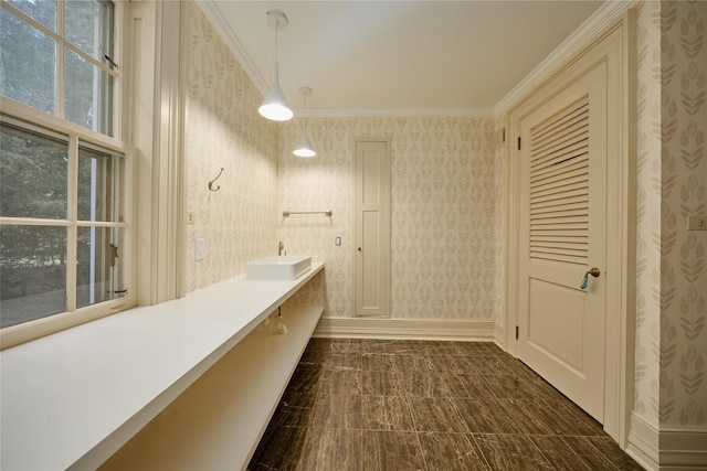 94 Cedar Ave, Poughkeepsie, NY 12603 - full bathroom with double vanity, wallpapered walls, crown molding, and baseboards