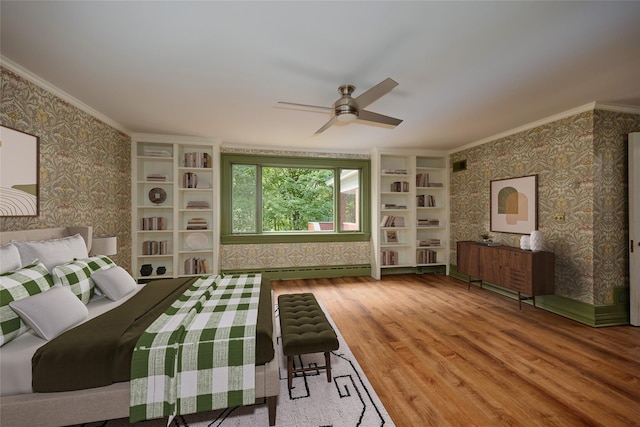 94 Cedar Ave, Poughkeepsie, NY 12603 - bedroom with wallpapered walls, wood finished floors, crown molding, and a baseboard radiator