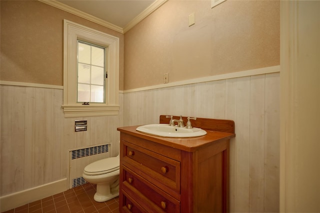 94 Cedar Ave, Poughkeepsie, NY 12603 - half bath featuring radiator, a wainscoted wall, vanity, toilet, and tile patterned flooring