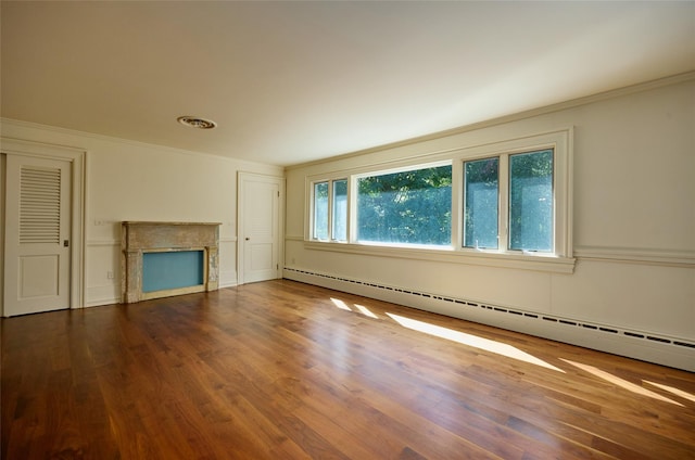 94 Cedar Ave, Poughkeepsie, NY 12603 - unfurnished living room featuring a baseboard radiator, ornamental molding, wood finished floors, and a fireplace