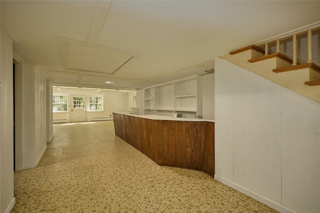 94 Cedar Ave, Poughkeepsie, NY 12603 - bar area with baseboards, a baseboard radiator, and stairs